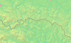 Mapa konturowa Beskidu Niskiego, po lewej znajduje się czarny trójkącik z opisem „Biała Skała”