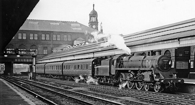 A steam-powered British Rail local train at Bolton Trinity Street station in 1965