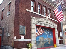 A typical New York City firehouse. Pictured is the Brooklyn quarters of Engine Co. 205 and Ladder Co. 118, depicting a mural dedicated to firefighters lost on 9/11. BrooklynFirehouse911Memorial.JPG