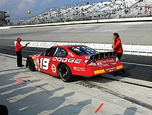 Casey Atwood in the No. 19 at Dover International Speedway in 2001 Casey Atwood happy hour (2686398184).jpg