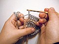Crocheting a round.