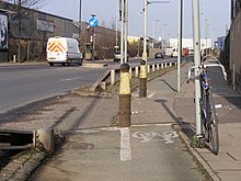 A cycle track in London. The UK has not implemented cycle tracks in a similar manner to the Netherlands. Cycle track Northumberland Park N17 - 46068930994.jpg