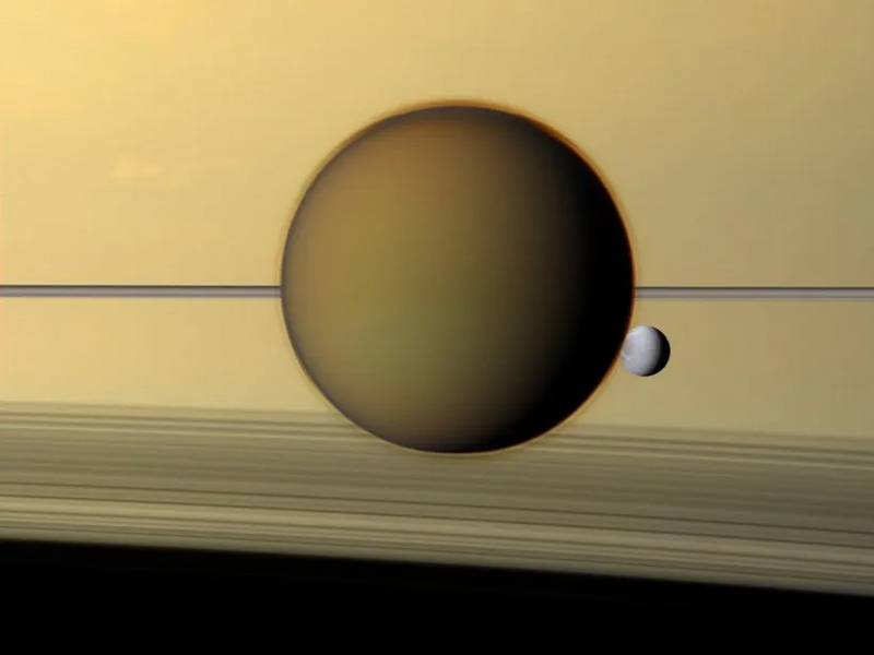 File:Dione behind Titan.webp