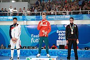 Deutsch: Fechten bei den Olympischen Jugend-Sommerspielen 2018: Tag 1, 7. Oktober 2018, Jungen, Säbel, Siegerehrung - Gold: Krisztián Rabb (HUN), Silber: Hyun Jun (KOR), Bronze: Mazen Elaraby (EGY); Medaillen überreicht durch IOC-Mitglied Britta Heidemann, Maskottchen überreicht durch FIE-Generalsekretär Emmanuel Katsiadakis English: Fencing at the 2018 Summer Youth Olympics at 7 October 2018 – Boys' sabre Medal ceremony – Gold: Krisztián Rabb (HUN), Silver: Hyun Jun (KOR), Bronze: Mazen Elaraby (EGY); Medal presenter: IOC member Britta Heidemann, Mascot presenter: FIE Secretary General Emmanuel Katsiadakis