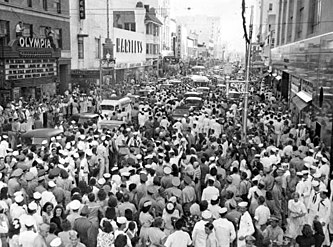 Crowds on Flagler Street in Downtown Miami on August 15, 1945, 20 minutes after the announcement of Japan's surrender at the end of World War II
