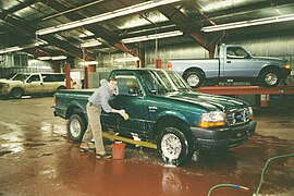 Prototype vehicles and a Ford "wash boy" at the Ford Bemidji Test Center, Bemidji, Minnesota USA.