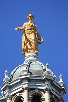 Golden statue of Fame on top of the main dome, Bank of Scotland Head Office, Edinburgh by John Rhind Golden statue of Fame on top of the main dome, Bank of Scotland Head Office, Edinburgh.JPG