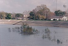 A levee keeps high water on the Mississippi River from flooding Gretna, Louisiana, in March 2005. GretnaLevee.jpg
