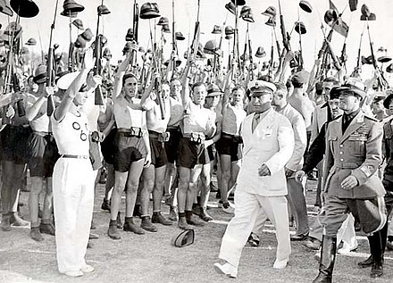 Benito Mussolini and Fascist Blackshirt youth in 1935