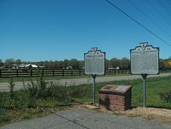 Historic markers, Governors Land and Battle of Green Spring, with land behind.jpg