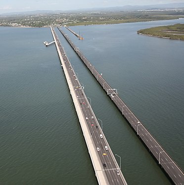 The Houghton Highway (right) and Ted Smout Memorial Bridge (left) crossing Bramble Bay in Brisbane
