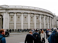 The "screen wall" that joins the original entrance to Gandon's extension. This is the most recognisable image of the building, though ironically, while originally built by Gandon, it was given its modern appearance by the Bank of Ireland. A matching screen wall faces onto Foster Place on the other side of the building. Irish Parliament old BOI screenwall.jpg