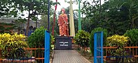 The statue of Swami Vivekananda present in JNV Cuttack with initials "A Born Leader Of Young Minds"