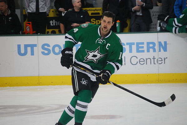 Benn with the Stars in February 2014. Benn was named the captain of the Stars during the 2013 off-season.