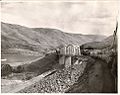 Depth of John Day Dam pool is illustrated by this 1967 photo showing the new UPRR bridge, with old bridges at sites to be submerged below.