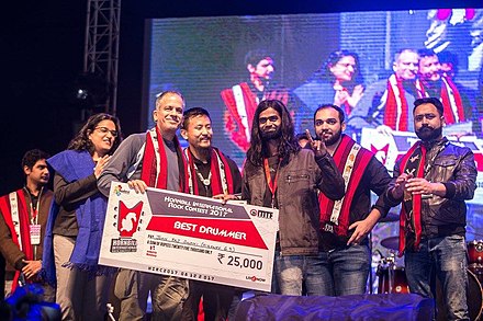 Highway 69's drummer receiving the Best Drummer award from Uday Benegal at Hornbill International Rock Contest 2017 in Nagaland.