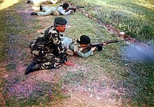 A female soldier of the Rejimen Askar Wataniah with a L1A1 SLR, circa 1990s. L1A1 SLR1.jpg