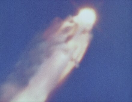 Challenger is enveloped in flaming liquid propellant after rupture of the liquid oxygen tank