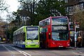 A tram on route 1, and bus on route 466 on Addiscombe Road.