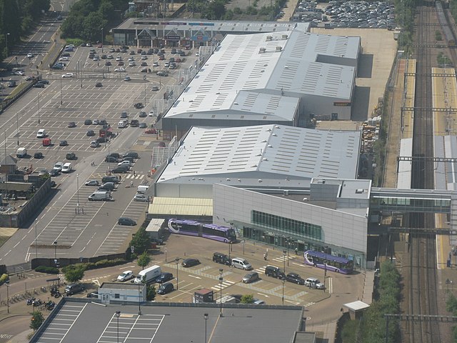 Aerial photo of the station with former airport shuttle buses waiting in front