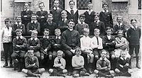 Canon William Joseph McClemans with pupils, in 1914 McClemans 1914.jpg