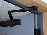 Manual door closer. Mechanical door closer.jpg