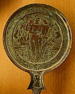 An Etruscan bronze mirrorback, 4th-3rd century BCE (Musée du Louvre)