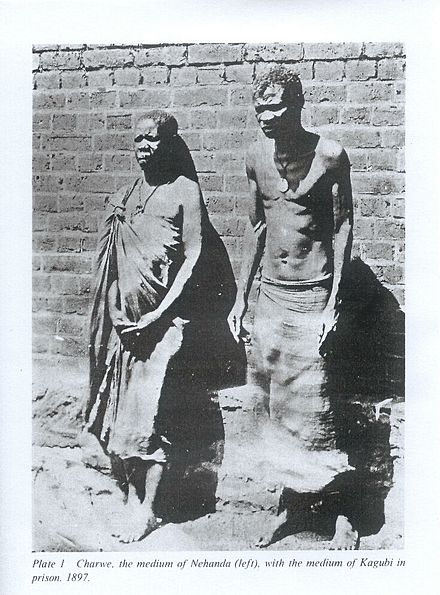 Nehanda Nyakasikana (left) and Sekuru Kaguvi (right), after their 1897 capture Nehanda Nyakasikana et Sekuru Kaguvi.jpg