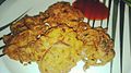 Onion fritters (piyaji) is a Bengali dish made with onions.