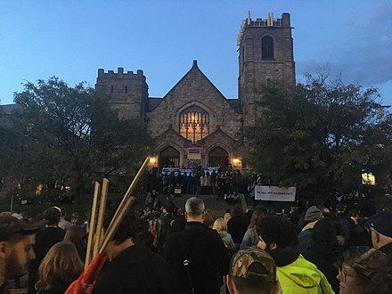 People gathered again at the intersection of Forbes and Murray Avenues in front of the Sixth Presbyterian Church on October 30. On the same day, Trump visited Pittsburgh in response to the shooting incident.[128]