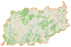 Mapa konturowa powiatu kartuskiego, po prawej znajduje się punkt z opisem „Żukowo”