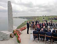 US President Ronald Reagan giving a speech commemorating the 40th anniversary of the event.