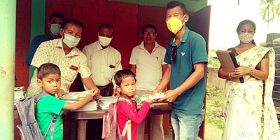 Distribution of free textbooks to children in a school in Assam Right to education.jpg