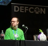 Dingledine at a panel discussion during DEFCON 2023 Roger Dingledine DEFCON 2023 presentation.jpg