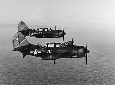 Two SB2C Helldiver dive bombers in flight in 1943. VA-154 flew similar aircraft. SB2C Helldiver 1943.jpg