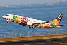 A Skynet Asia Airways Boeing 737-400 taking off from Haneda Airport, Tokyo (2007)