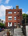 18th-century Saint George's Rectory outside St George in the East in the eponymous area. [601]