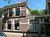 Voormalig schoolgebouw, oorspronkelijk een koetshuis met stal (Gouda-Centrum)