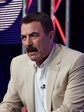 Tom Selleck played Monica's boyfriend Dr. Richard Burke in several episodes between 1995 and 2000. Tom Selleck 2010.jpg