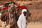 Tubuman med sin kamel