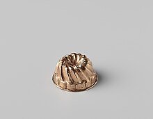 Miniature cooking shape; circa 1700-1799; copper; 1.8 x 3.7 cm; Rijksmuseum (Amsterdam, the Netherlands) Tulbandvorm, spiraalvormig, BK-NM-5783-148.jpg