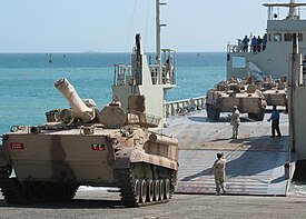 US Navy 030223-N-1050K-001 UAE offloads a BMP3 Tank at a Kuwaiti port facility from its Elbahia L62 landing craft.jpg