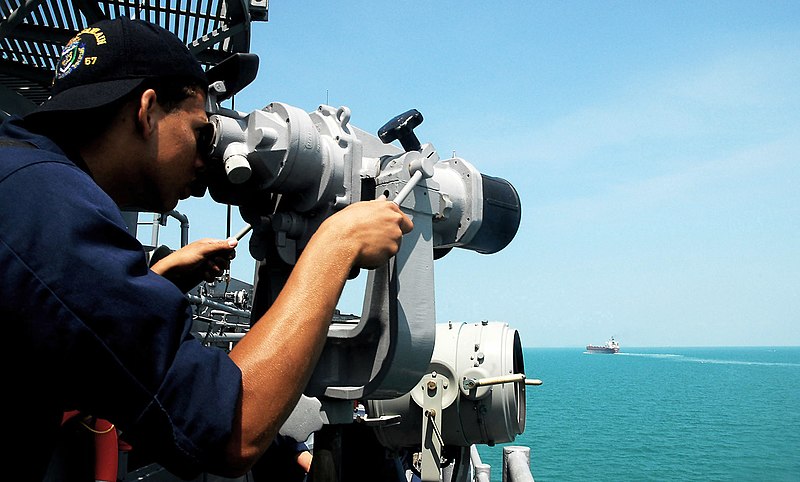 File:US Navy 090210-N-4774B-105 Seaman Anthony Brown observes boat traffic using ship-mounted binoculars aboard the guided-missile cruiser USS Lake Champlain (CG 57).jpg