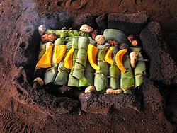Pascuense umu, meat and vegetables roasted in an earth oven Umu.JPG