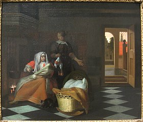 Deux femmes et un enfant avec une poule dans un intérieur