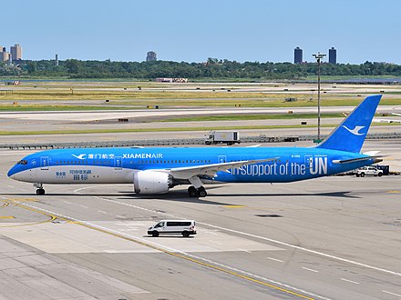 A XiamenAir Boeing 787-9 Dreamliner in a special United Nations Sustainable Living livery