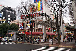 Entrance to Isezaki Mall, a pedestrian shopping street paved with red brick and lined with colorful stores in Isezakichō, Yokohama