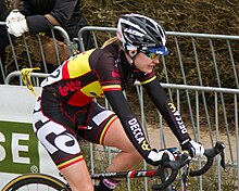 Jolien D'Hoore (pictured in 2013) shares the record for the most Belgian championships in the women's category, with four victories. 2013 Ronde van Vlaanderen, jolien dhoore (20164101278).jpg