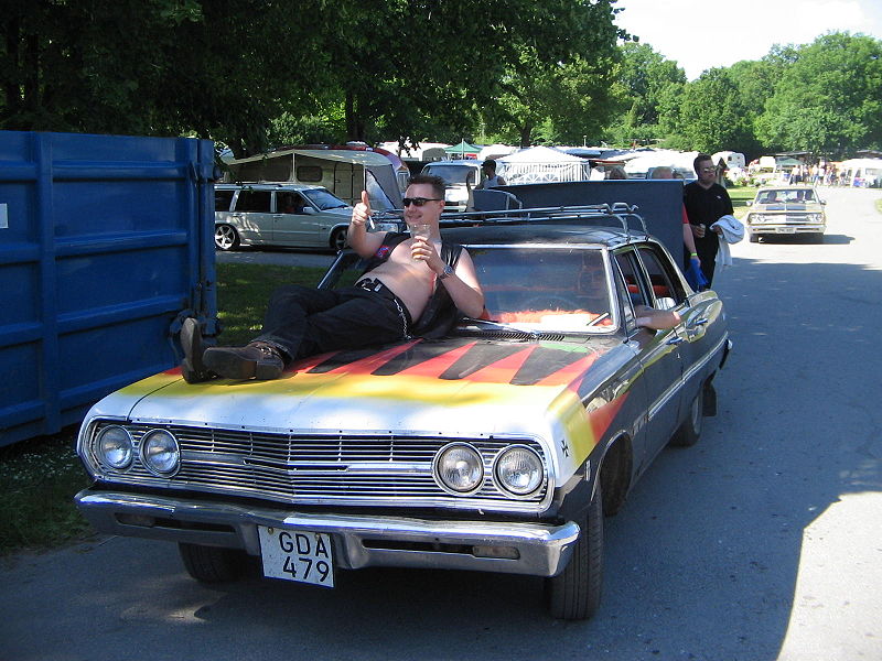 File:60's car, unknown model and a raggare at Power Big Meet 2005.jpg