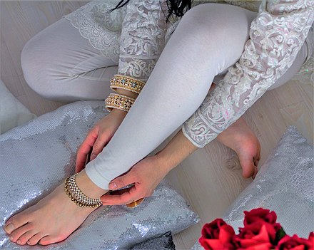 An anklet on female feet